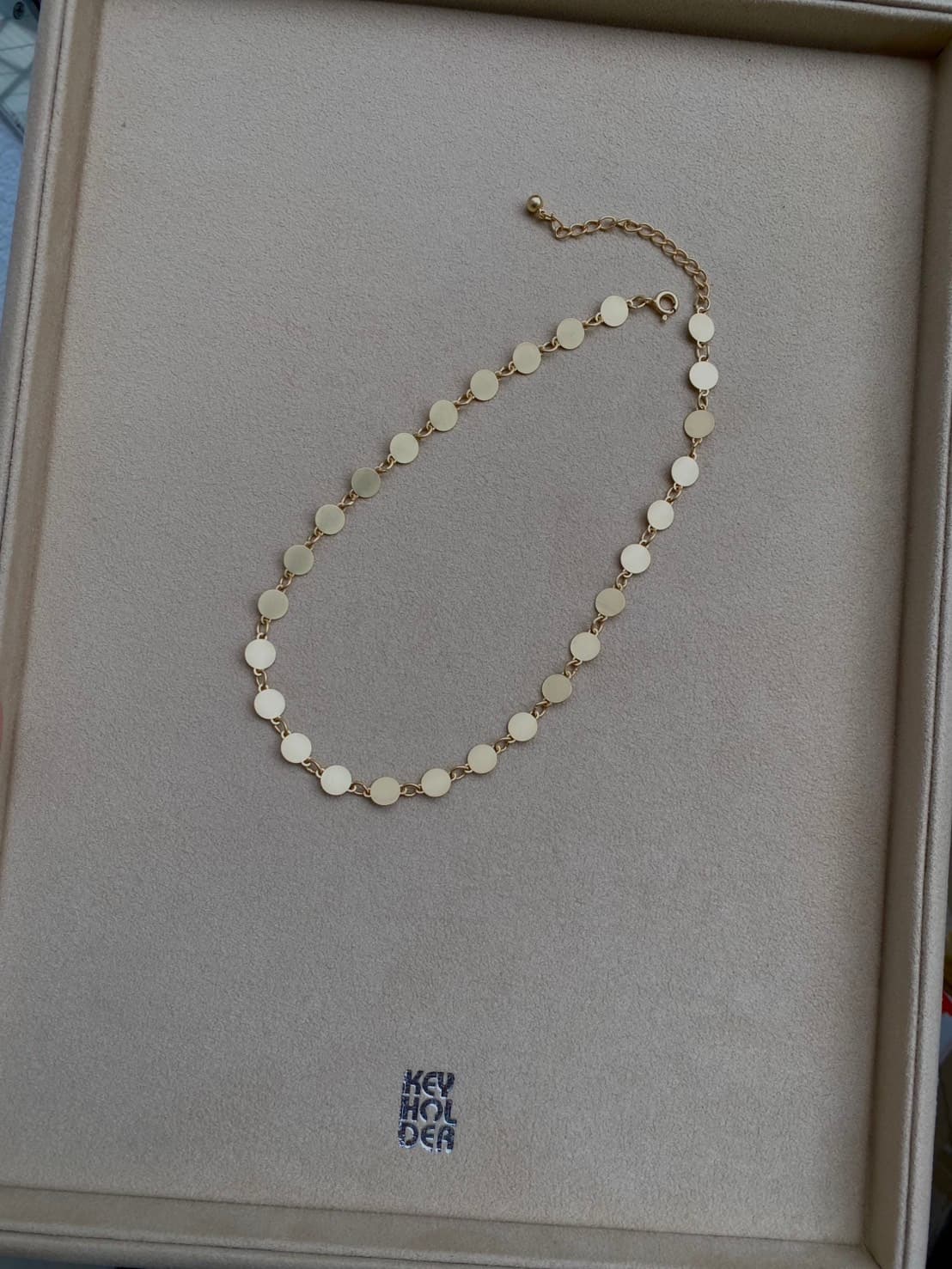 CIRCLE - ETCHED METAL NECKLACE