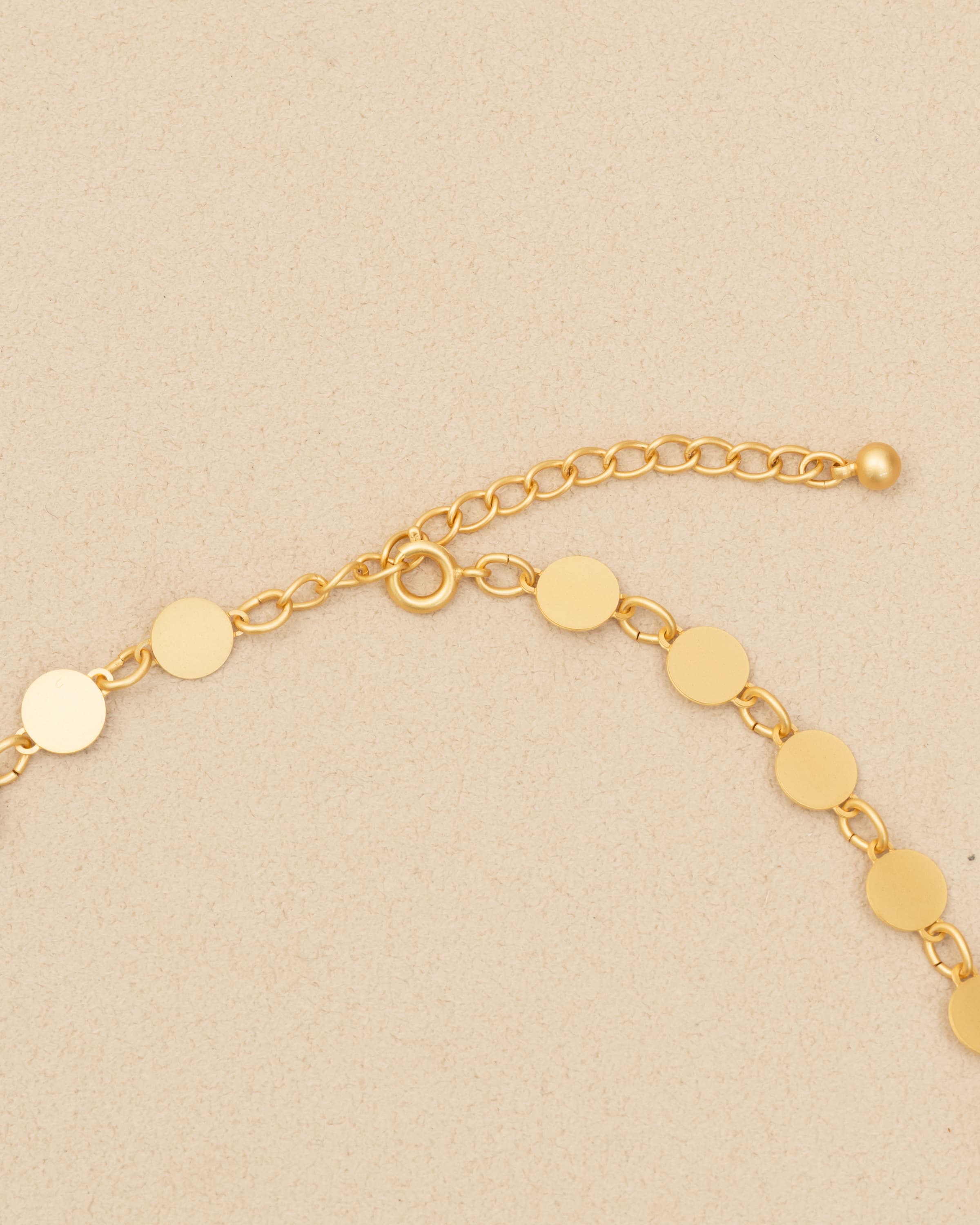 CIRCLE - ETCHED METAL NECKLACE